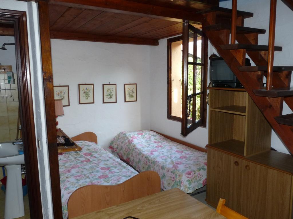 Ferienwohnung Monolocale San Teodoro Zimmer foto