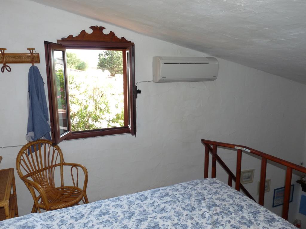 Ferienwohnung Monolocale San Teodoro Zimmer foto