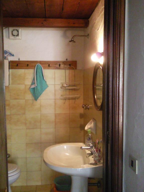 Ferienwohnung Monolocale San Teodoro Zimmer foto